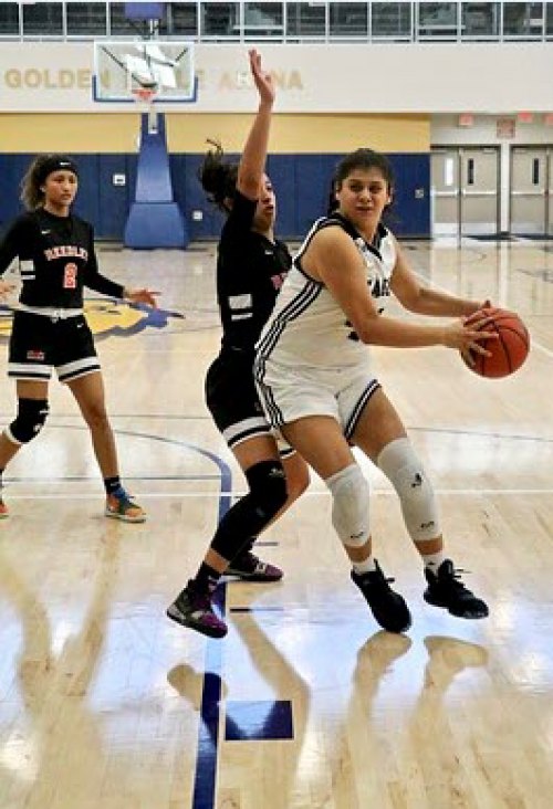 Alejandra Fernandez on the Golden Eagles basketball court.